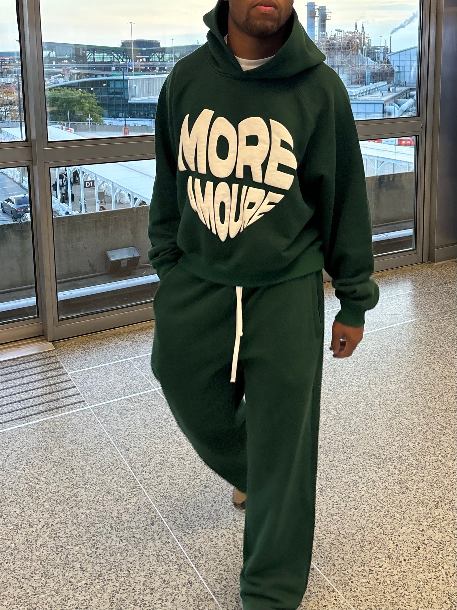 Heart shaped puff print more amoure logo on green tracksuit