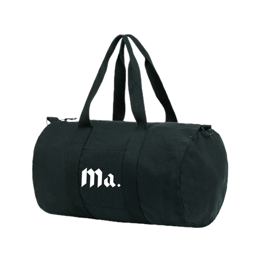 Black More amoure Duffle bag made out of organic cotton with the Ma. logo printed at the front