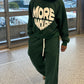 Heart shaped puff print more amoure logo on green tracksuit 